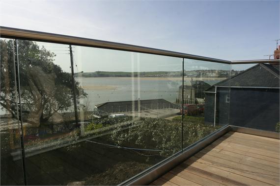Frameless Glass Handrail on balcony overlooking sea